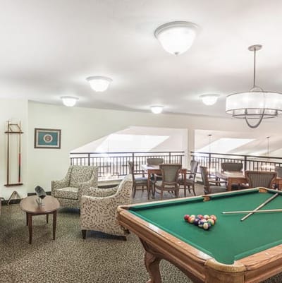 Interior view of a common area with a pool table