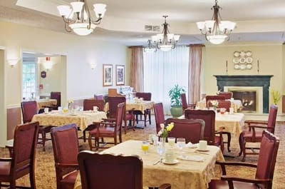 Dining room with tables set for breakfast