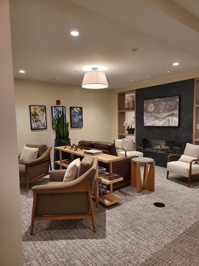 Cozy common area with seating and artwork