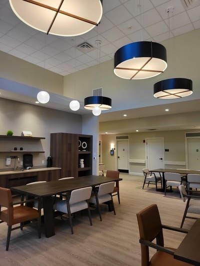Interior view of a modern common area with lighting fixtures