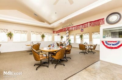 Dining area with tables and chairs in an interior setting