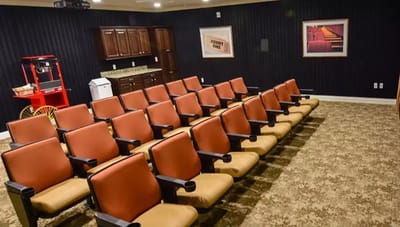 Interior of a theater-style room with seating
