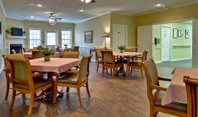 Bright dining area with tables set for meals