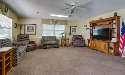 Interior common area with seating and television