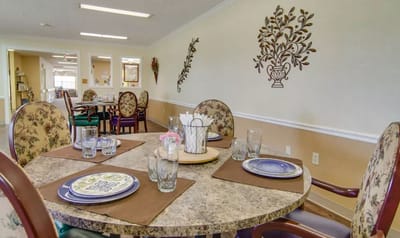 Dining area with decorated tables and chairs