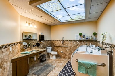 A well-lit interior bathroom with modern amenities