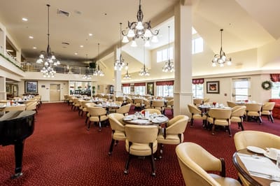 Dining area with tables set for a meal