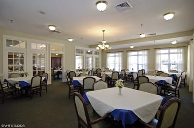Dining room with tables set for meals