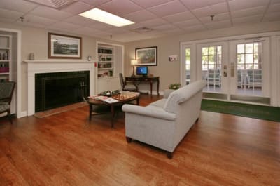 Common area with seating and fireplace