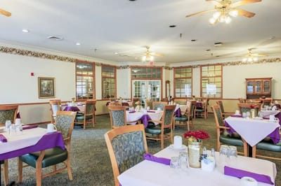 Bright dining area with tables set for meals