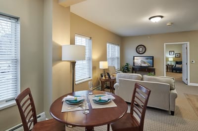 Bright interior of a resident's living area with dining table