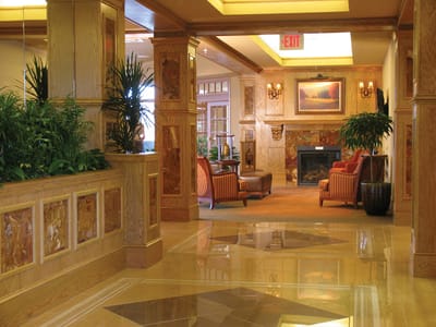 Interior of a senior living facility lobby with seating