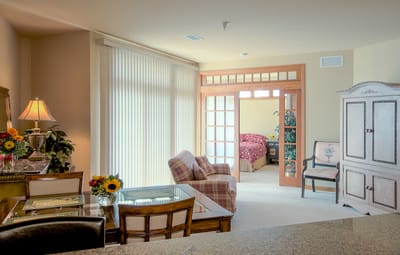 Interior view of a resident's room with cozy furnishings