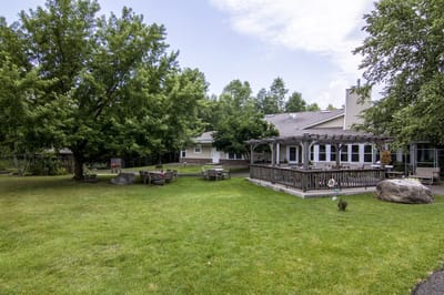 Outdoor space with seating and greenery