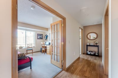 Interior view of a private resident room with furniture