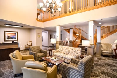 Common area with seating and a staircase