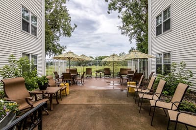 Outdoor seating area with umbrellas and chairs