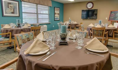 Dining area set with elegant table settings