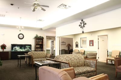 Interior common area with seating and aquarium