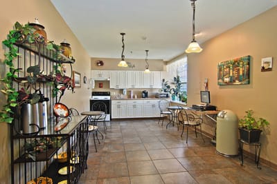 Bright kitchen area with seating and decor
