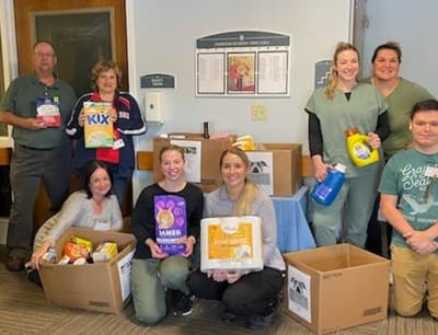 Staff and residents participating in a donation drive