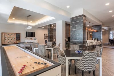 Common area with tables and game features