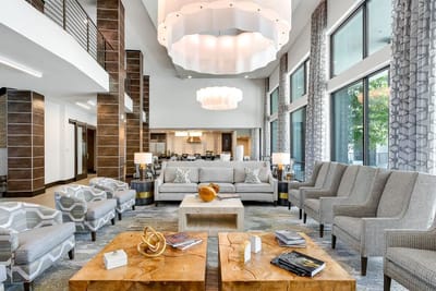 Bright common area with seating and modern decor