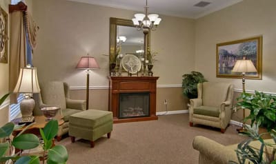 Cozy common area with comfortable seating and plants