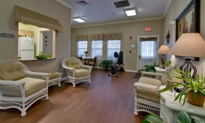 Bright common area with comfortable seating and plants