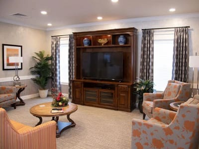 Cozy common area with comfortable seating and a TV