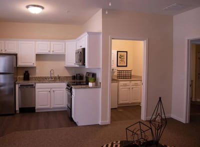 Modern kitchen area in a senior living apartment