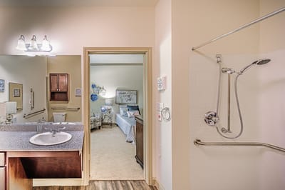 Interior view of a resident's bathroom and bedroom