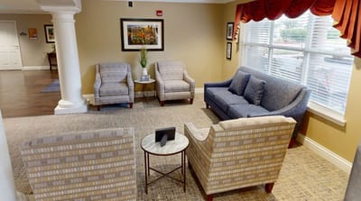 Cozy common area with seating and natural light
