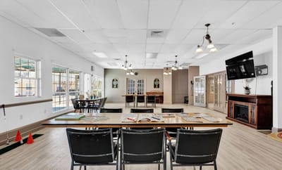 Bright common area with tables and seating