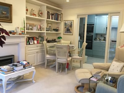 Cozy common area with bookshelves and seating