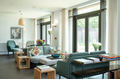 Bright common area with modern seating and decor