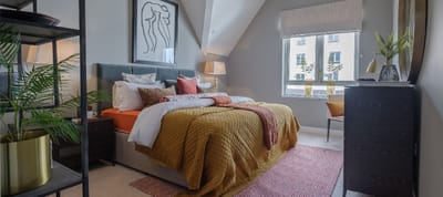 Cozy resident room with a comfortable bed and decor