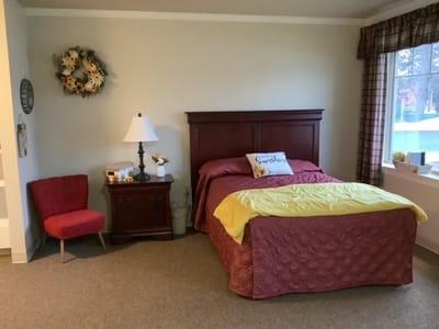 Cozy private resident room with a bed and decor