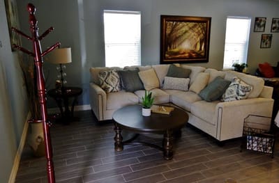 Cozy common area with seating and artwork