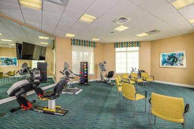 Interior view of a fitness room with exercise equipment
