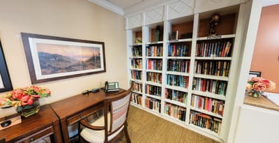 Interior view of a reading room with bookshelves