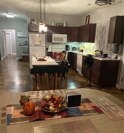 Interior view of a kitchen area with decorative table