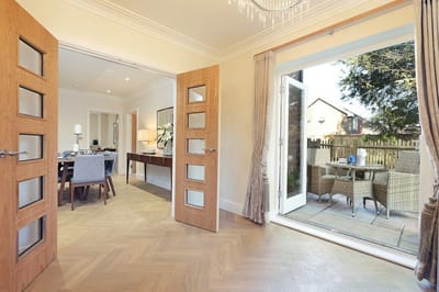 Bright common area with doors leading to an outdoor space