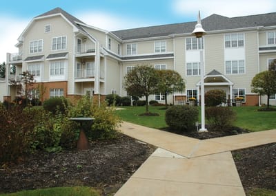 Exterior view of Redstone Highlands facility with landscaped grounds