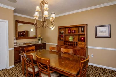 Interior dining room with wooden furniture and decor