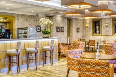 Bright dining room with modern decor and seating
