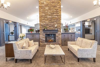 Cozy common area with seating and fireplace