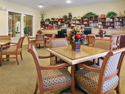 Bright common area with tables and seating