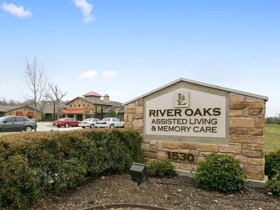 Exterior view of River Oaks assisted living facility sign