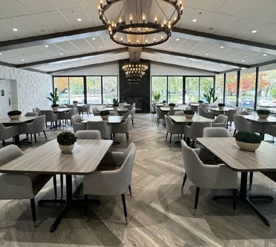 Bright and modern dining area with tables and chairs
